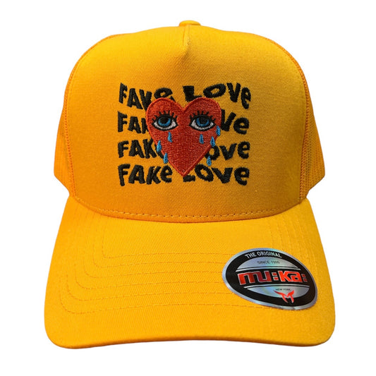 MUKA FAKE LOVE GOLD TRUCKER HAT
